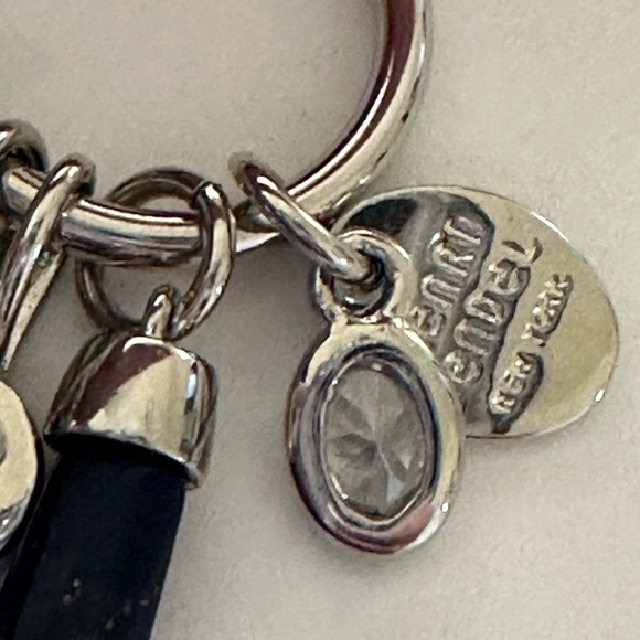 Henri Bendel  silver tone necklace with dark blue crystal and logo charms disc - Picture 5 of 9